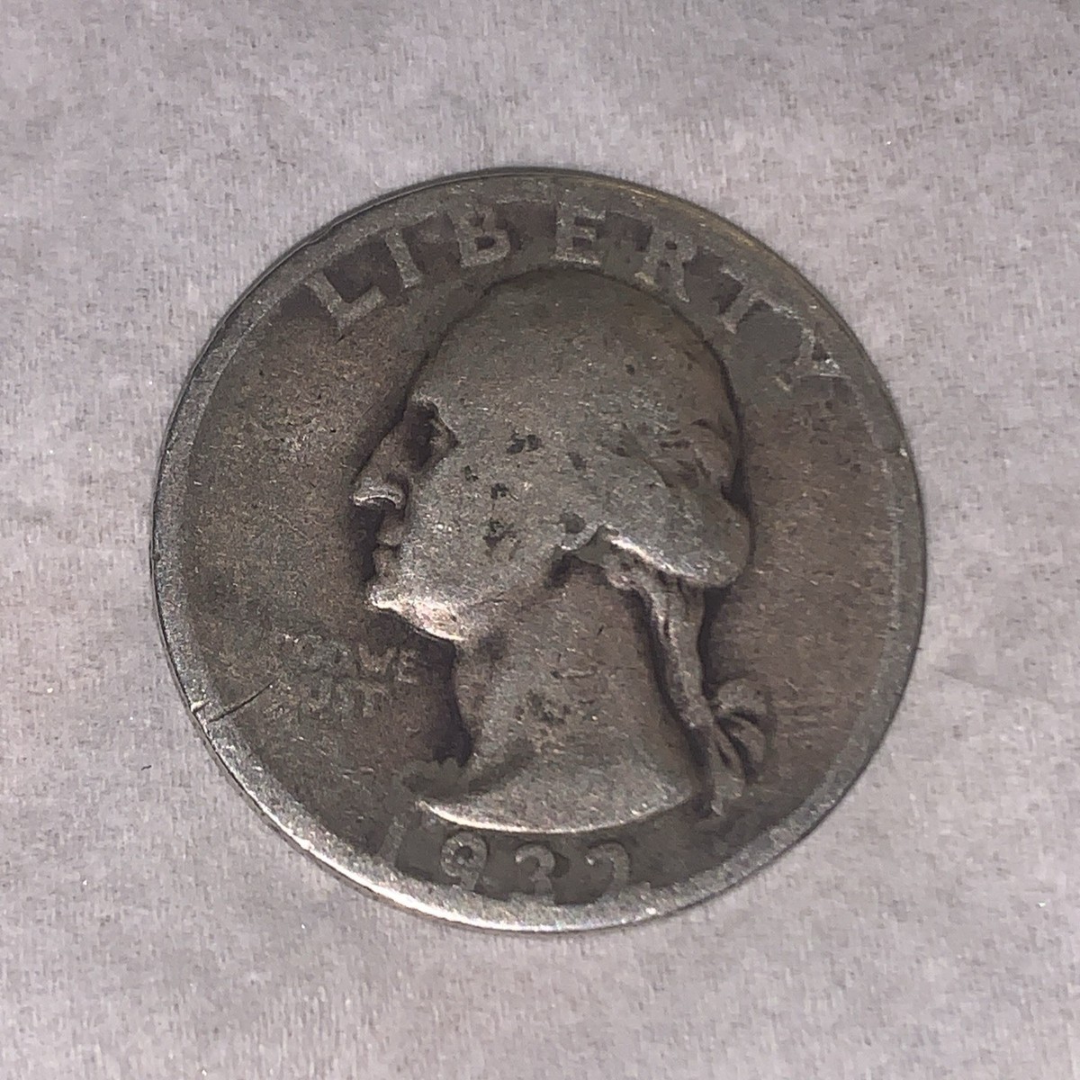1932 Washington Quarter broad strike error showing enlarged diameter and spread design from missing collar during striking